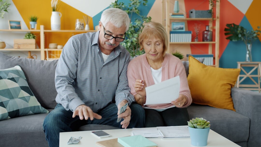 senior couple reviewing budget papers
