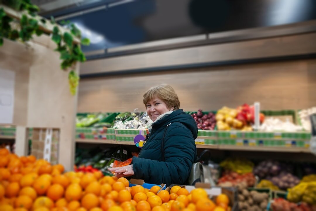elderly woman shopping for groceries