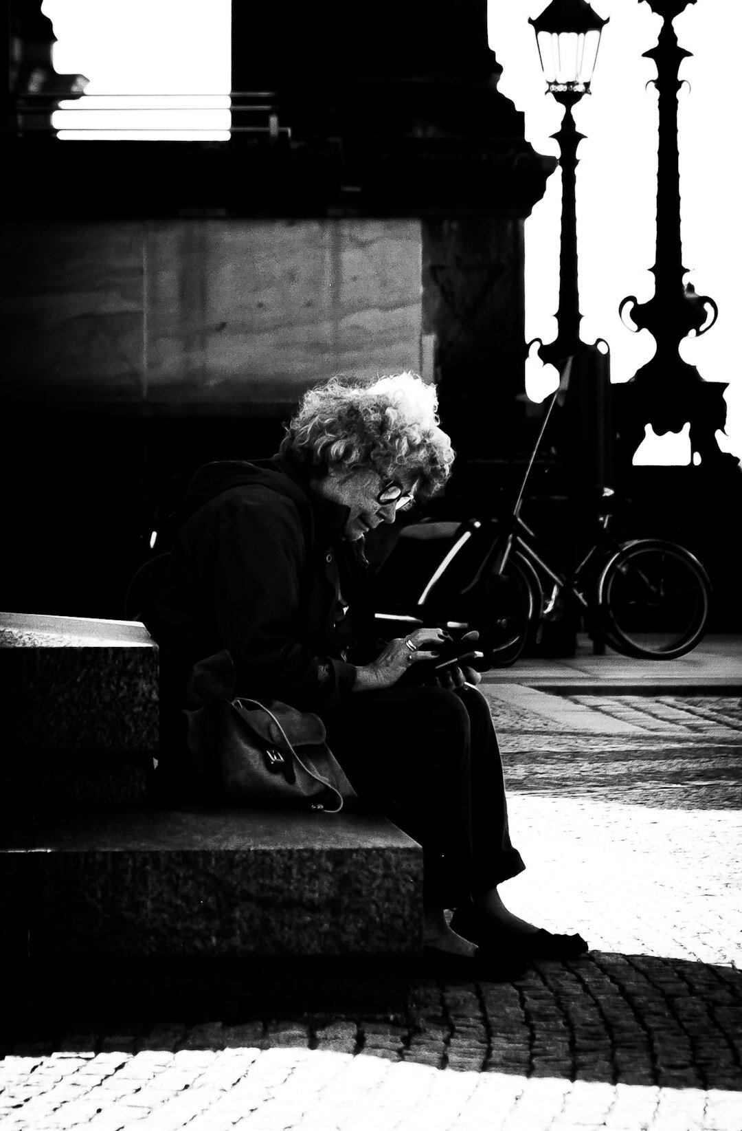 elderly woman writing